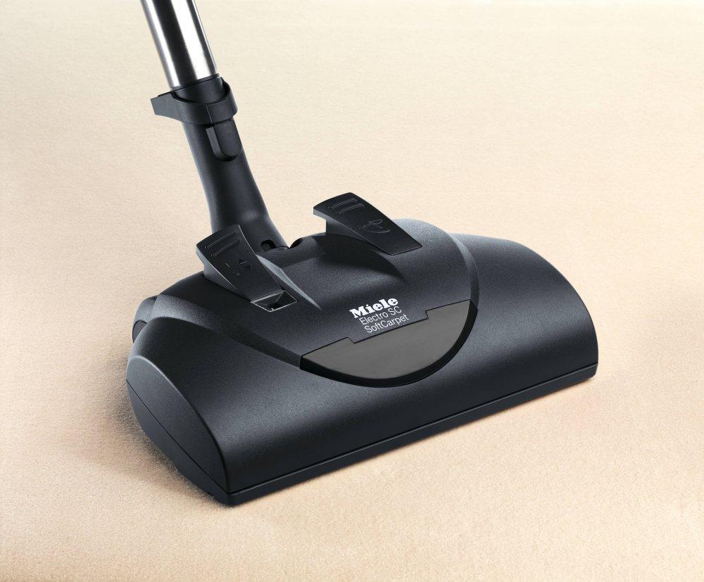 Miele CLASSIC C1 HOME CARE POWERLINE SBCN 0MANGO RED Classic C1 Home Care Powerline – Sbcn0 – Bodenstaubsauger mit Elektrobürste für die gründliche Reinigung von strapazierfähigen Teppichen.