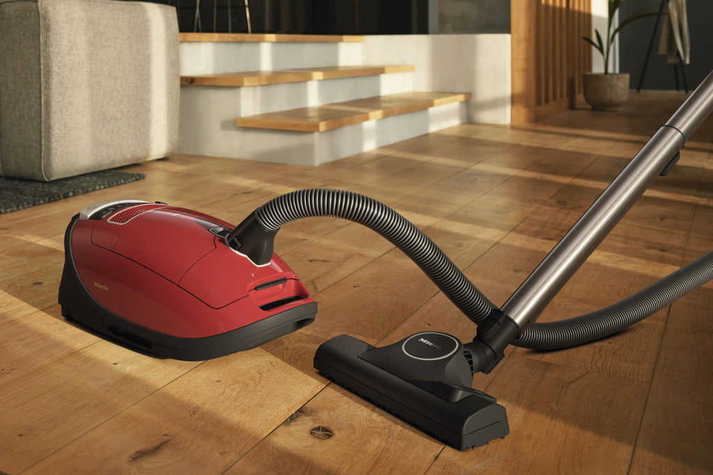 Miele COMPLETE C3 HOMECARE POWERLINE SGFE0 MANGO ROT Complete C3 Homecare Powerline - Sgfe0 - Bodenstaubsauger mit umfangreichem Zubehör für nahezu jede Reinigungsherausforderung.